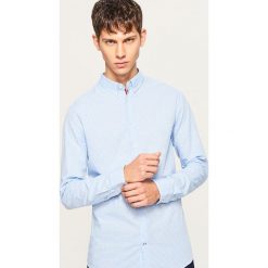 Koszula slim fit w drobną kratkę - Niebieski. Koszule marki Under Armour. W wyprzedaży za 49.99 zł.