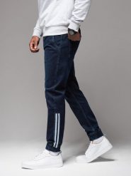 Męskie jeansowe joggery z lampasami – ciemnoniebieskie V4 OM-PADJ-0156 - XXL. Niebieskie joggery i bojówki Ombre Clothing, na co dzień, l, bez wzorów, z bawełny, retro. Za 161.99 zł.