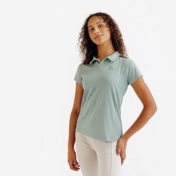 Koszulka polo z krótkim rękawem Club - zielona. Zielone koszulki polo FOUGANZA, bez wzorów, z elastanu, bez kołnierzyka, bez ramiączek, do jazdy konnej. Za 59.99 zł.