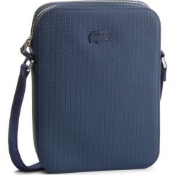 Saszetka LACOSTE - NH2179CE Peacoat 021. Saszetki i nerki marki LACOSTE. W wyprzedaży za 479.00 zł.