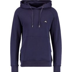 J.LINDEBERG THROW HOOD RING LOOP Bluza z kapturem navy. Bluzy marki J.LINDEBERG. W wyprzedaży za 353.40 zł.