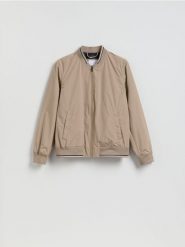 Kurtka bomberka ze stójką - beżowy. Brązowe kurtki Reserved, l, bez wzorów, z tkaniny, bez kaptura. Za 139.99 zł.