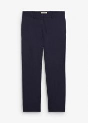 Spodnie garniturowe o kroju relaxed fit. Niebieskie eleganckie spodnie bonprix, m, bez wzorów. Za 169.99 zł.