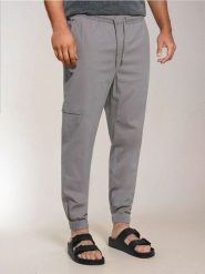 Spodnie jogger - szary. Szare joggery i bojówki Sinsay, m, bez wzorów. Za 69.99 zł.