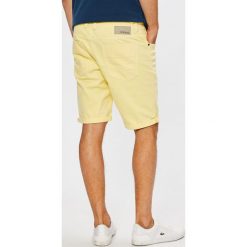 Camel Active - Szorty Madison. Żółte szorty Camel Active, bez wzorów, z bawełny, casualowe. W wyprzedaży za 179.90 zł.