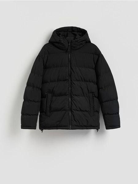 Pikowana kurtka z kapturem - czarny. Czarne kurtki Reserved, l, bez wzorów, z tkaniny, z kapturem. W wyprzedaży za 199.99 zł.