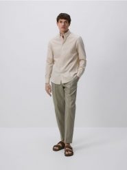 Koszula regular z lnem - beżowy. Brązowe koszule Reserved, l, bez wzorów, z bawełny, bez kołnierzyka, bez ramiączek. Za 149.99 zł.