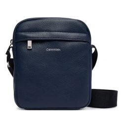 Saszetka Calvin Klein. Niebieskie saszetki i nerki CALVIN KLEIN, bez wzorów. Za 329.99 zł.