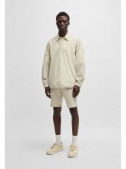 Hugo Boss Szorty chino w kolorze beżowym rozmiar: W35. Brązowe eleganckie spodnie HUGO BOSS, na co dzień, z bawełny. Za 239.99 zł.