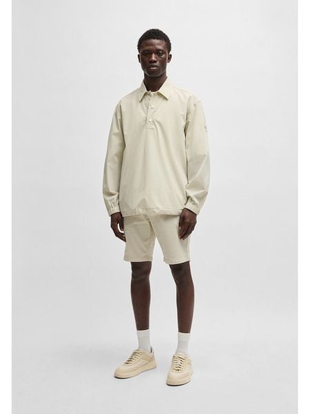 Hugo Boss Fashion Szorty chino w kolorze beżowym rozmiar: W33. Brązowe eleganckie spodnie Hugo Boss Fashion, na co dzień, z bawełny. Za 129.45 zł.