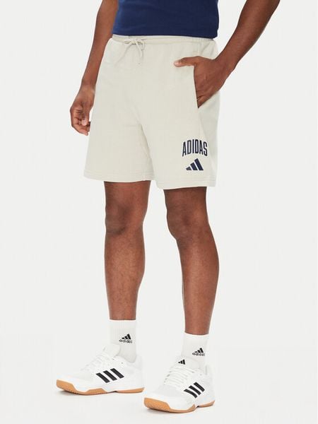 Adidas Szorty sportowe Collegiate JM1726 Beżowy Regular Fit. Brązowe krótkie spodenki sportowe Adidas, m, bez wzorów, z bawełny. Za 149.99 zł.