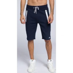 Spodenki dresowe męskie SKMD253 - ciemny granatowy. Krótkie spodenki sportowe marki 4F. Za 99.99 zł.