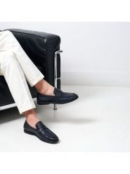 British Passport Skórzane mokasyny "Penny" w kolorze granatowym rozmiar: 43. Niebieskie botki sznurowane British Passport, bez wzorów, bez obcasa, bez zapięcia. Za 347.99 zł.