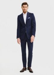 PAKO LORENTE – Wełniane spodnie garniturowe w kolorze granatowym. Eleganckie spodnie Pako Lorente, do pracy, m, bez wzorów, z wełny. Za 799.99 zł.