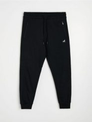 Spodnie dresowe regular jogger - czarny. Czarne joggery i bojówki Sinsay, l, bez wzorów, z dresówki. Za 59.99 zł.