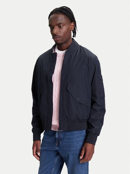Tommy Hilfiger Kurtka bomber MW0MW39629 Granatowy Regular Fit. Niebieskie kurtki Tommy Hilfiger, m, bez wzorów, z syntetyku, bez kaptura. Za 649.99 zł.