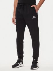 Adidas Spodnie dresowe Essentials Fleece Regular Tapered Joggers HL2236 Czarny Regular Fit. Czarne joggery i bojówki Adidas, m, bez wzorów, z bawełny, sportowe. Za 159.99 zł.