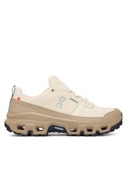 On Trekkingi Cloudrock Low WP 3MF10255 Beżowy jasny. Brązowe buty trekkingowe On, bez wzorów, z materiału, bez zapięcia. Za 854.99 zł.