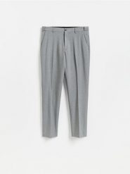 Garniturowe spodnie slim fit - ciemnoszary. Szare garnitury Reserved, l, bez wzorów, z tkaniny. Za 169.99 zł.