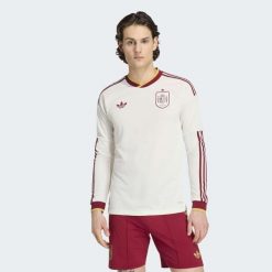 Koszulka wyjazdowa z długim rękawem Hiszpania 26 Authentic. Białe bluzki z długim rękawem Adidas, bez wzorów, bez kołnierzyka, bez ramiączek. Za 699.00 zł.
