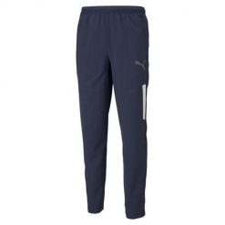 Spodnie treningowe męskie Puma Teamliga Sideline. Niebieskie spodnie treningowe długie Puma, m, bez wzorów, z dresówki. Za 285.00 zł.