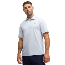 Męska techniczna golfowa koszulka polo Siroko Birkdale Blue. Niebieskie koszulki polo SIROKO, m, bez wzorów, z tkaniny, bez kołnierzyka, bez ramiączek, na golfa. Za 211.00 zł.