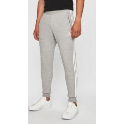 Adidas Originals - Spodnie. Szare spodnie materiałowe adidas Originals, na co dzień, l, bez wzorów, z bawełny, casualowe. Za 249.90 zł.