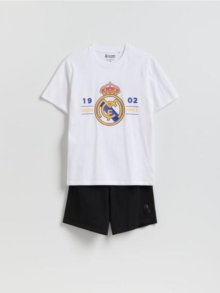 Dwuczęściowa piżama Real Madrid - biały. Białe piżamy Reserved, l, bez wzorów, z bawełny, bez ramiączek. Za 149.99 zł.
