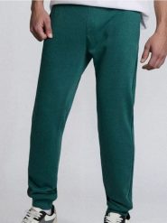 Spodnie jogger slim fit - ciemny turkus. Joggery i bojówki Sinsay, l, bez wzorów. Za 29.99 zł.