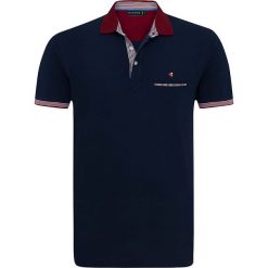 Koszulka polo "Whole" w kolorze granatowym. Koszulki polo sportowe marki Sir Raymond Taylor. W wyprzedaży za 128.95 zł.