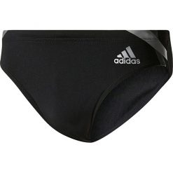 Kąpielówki w kolorze czarno-srebrnym. Kąpielówki adidas Swim. W wyprzedaży za 64.95 zł.