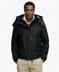 Superdry Kurtka Hooded Arctic Windcheater Luźny krój, wodoodporna powłoka. Czarne kurtki Superdry, l, bez wzorów, z gumy, z kapturem. Za 545.65 zł.