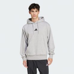 Bluza polarowa Essentials Feelcozy. Czarne bluzy z kapturem Adidas, xs, bez wzorów, z bawełny, z kapturem. Za 219.00 zł.