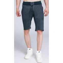 Spodenki dresowe męskie SKMD002 - ciemny granatowy melanż. Krótkie spodenki sportowe marki 4F. W wyprzedaży za 49.99 zł.