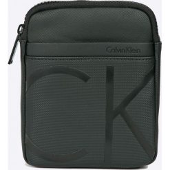 Calvin Klein Jeans - Saszetka. Saszetki i nerki marki Calvin Klein Jeans, w paski, z bawełny. W wyprzedaży za 199.90 zł.
