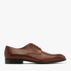 Brązowe półbuty męskie ANDREW. Brązowe eleganckie półbuty Ryłko, bez wzorów, ze skóry, bez obcasa, bez zapięcia. Za 499.99 zł.