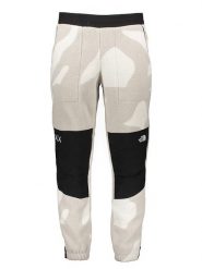 The North Face Spodnie polarowe w kolorze beżowo-kremowo-czarnym rozmiar: M. Brązowe spodnie treningowe długie The North Face, m, bez wzorów, z polaru. Za 372.47 zł.