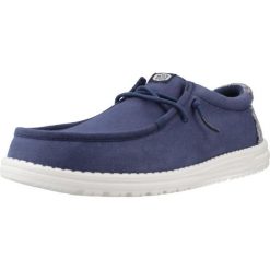Buty HEY DUDE WALLY SURF WASH Niebieski. Niebieskie buty turystyczne Hey dude, bez wzorów, z tkaniny, bez zapięcia, na fitness i siłownię. Za 264.90 zł.