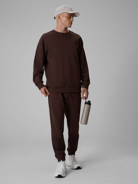 4F Spodnie dresowe joggery męskie - brązowe M. Brązowe joggery i bojówki 4F, m, bez wzorów, z dresówki. Za 149.99 zł.