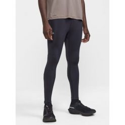 Legginsy zapinane na zamek Craft Adv Essence 2. Czarne legginsy długie sportowe Craft, m, bez wzorów, z materiału, do biegania. Za 238.00 zł.