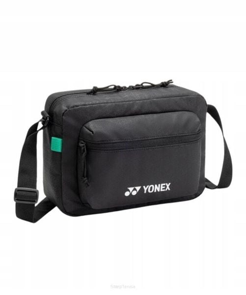 Saszetka sportowa Yonex Team Shoulder Bag. Czarne torby na ramię YONEX, bez wzorów, z syntetyku, na ramię, bez dodatków. Za 109.00 zł.