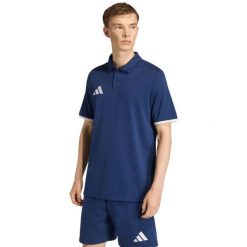 Koszulka męska adidas Entrada 26 Polo. Niebieskie koszulki polo Adidas, m, bez wzorów, z poliesteru, bez kołnierzyka, bez ramiączek, na fitness i siłownię. Za 78.99 zł.