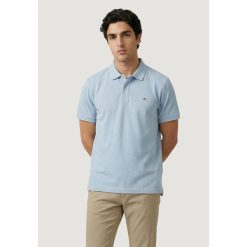 Polo z krótkim rękawem Mężczyzna GANT REG SHIELD SS PIQUE POLO. Niebieskie koszulki polo GANT, m, bez wzorów, bez kołnierzyka, bez ramiączek. Za 333.00 zł.